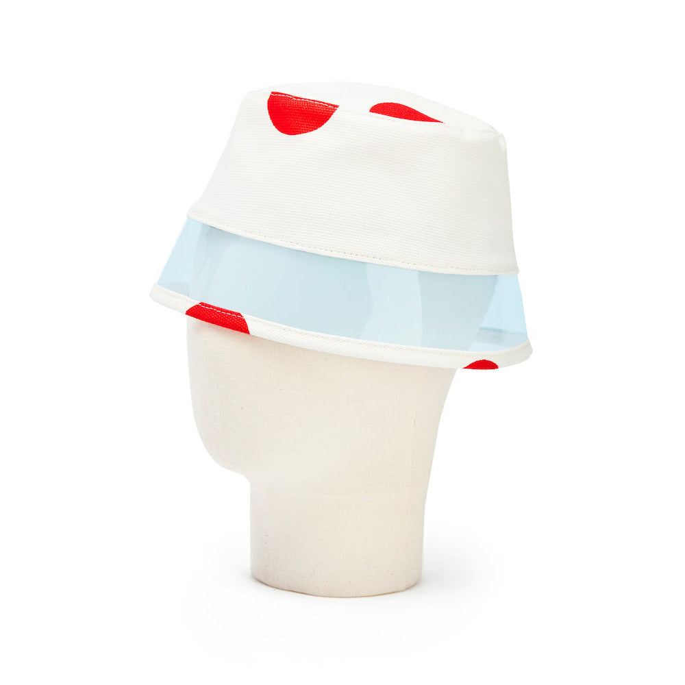 Buckethat with polkadot pattern on a white background
