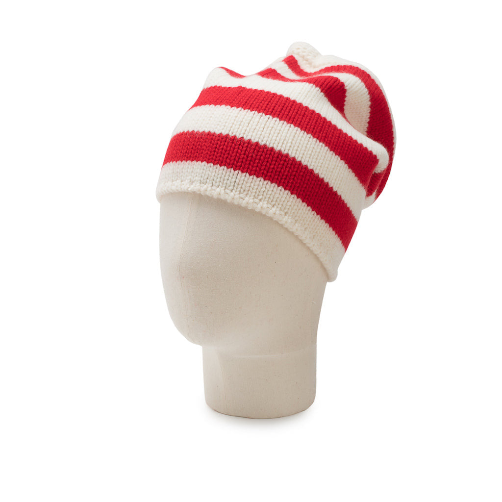 Red and white striped beanie on a mannequin head against a white background