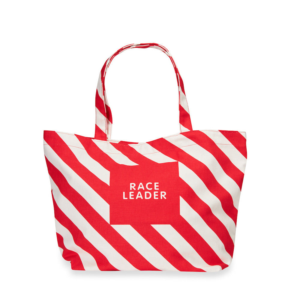 Red and white striped tote bag with 'RACE LEADER' text on a white background