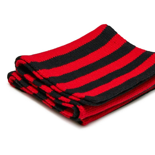 Folded red and black striped scarf on a white background