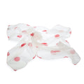 White foulard with red polka dots on a white background