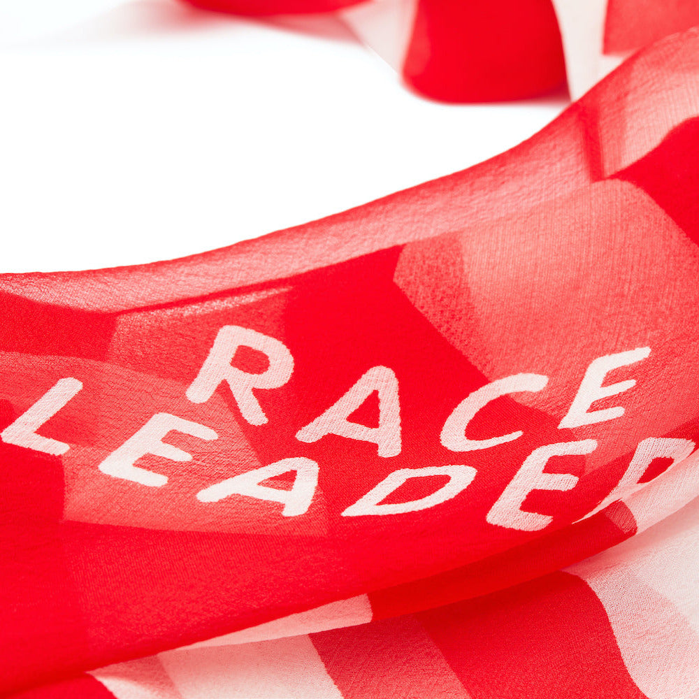 Red race leader silk foulard with white text on a red background