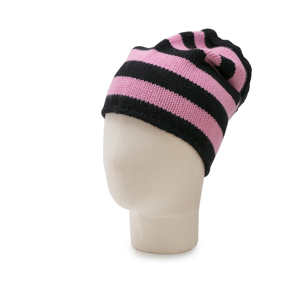 Pink and black striped beanie on a mannequin head against a white background