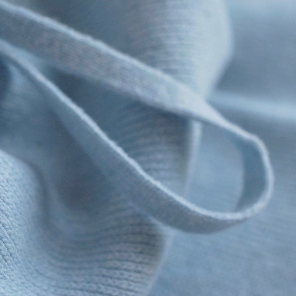 Close-up of light blue cashmere snood