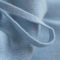 Close-up of light blue cashmere snood